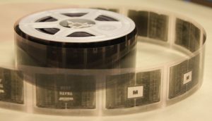 the difference between microfilm and mircofiche