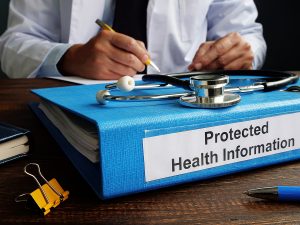 Folder with protected health information PHI as part of HIPAA rules.