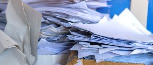 Stack old recycle papers or pile disposal ecology junk white paper business of document paperwork on trash papersheet. Get your document destruction needs met today with record nations
