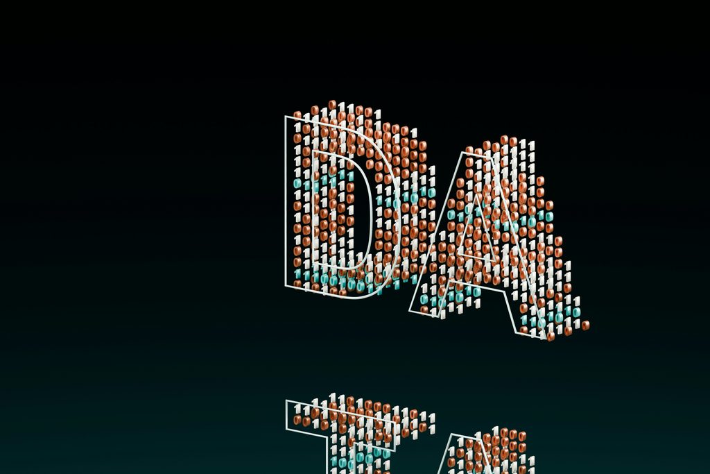 Small white, orange, and teal items formed to spell out the word data in capital letters floating, with the bottom  of the word visually cut off